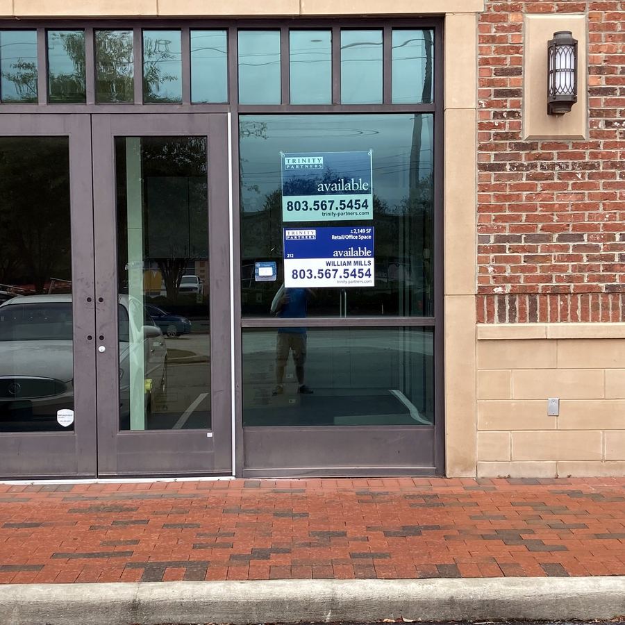 Window Vinyl for Trinity Partners completed by Carolina Realty Signs