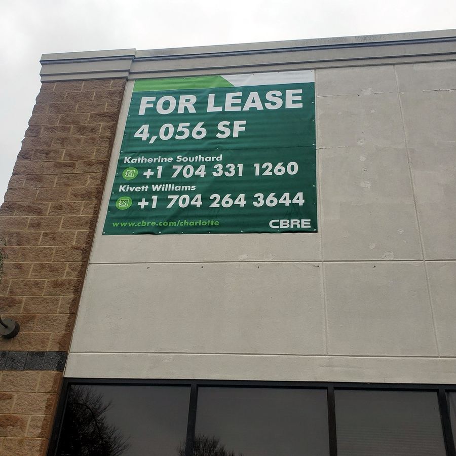 Banner Installation for CBRE Charlotte completed by Carolina Realty Signs