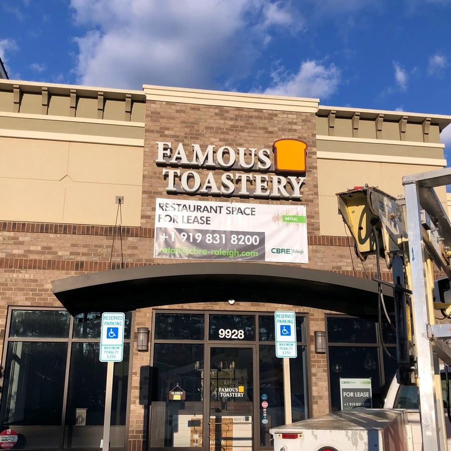 Banner Installation for CBRE RDU completed by Carolina Realty Signs