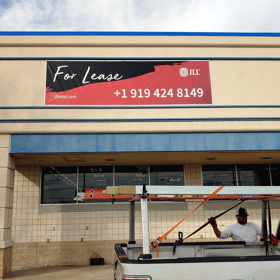 Banner Installation for Jones Lang LaSalle completed by Carolina Realty Signs