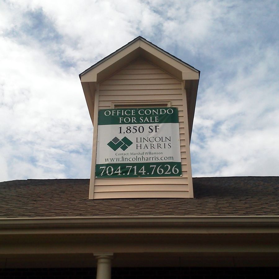 Banner Installation for Lincoln Property Group completed by Carolina Realty Signs