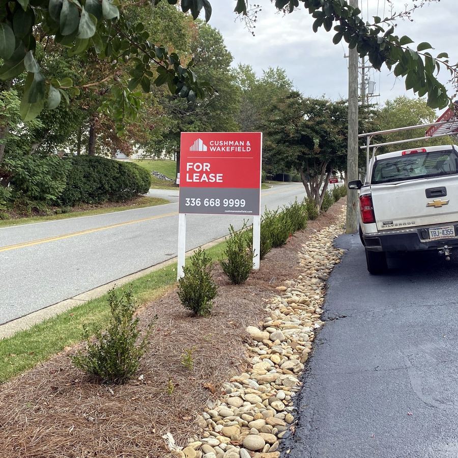 4x4 Property Sign for Cushman Wakefield Triad completed by Carolina Realty Signs