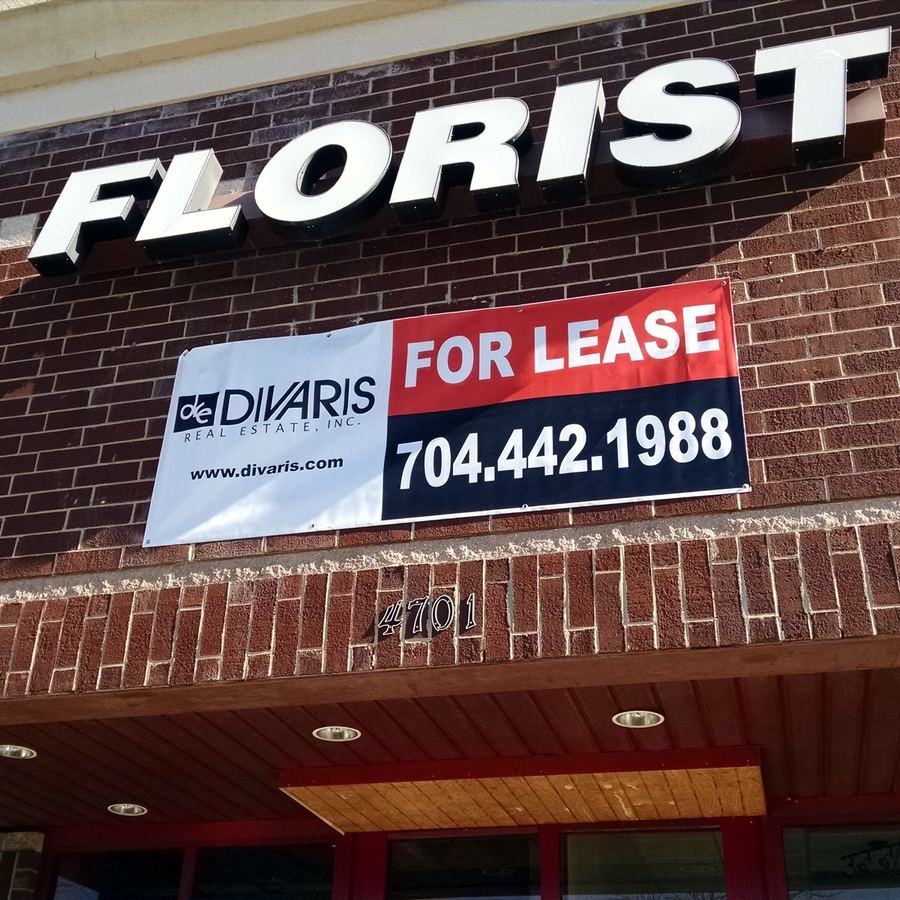Banner Installation for Divaris completed by Carolina Realty Signs