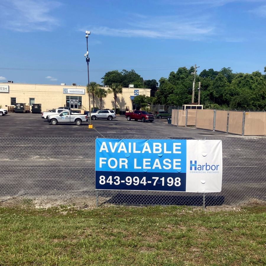Banner Installation for Harbor completed by Carolina Realty Signs